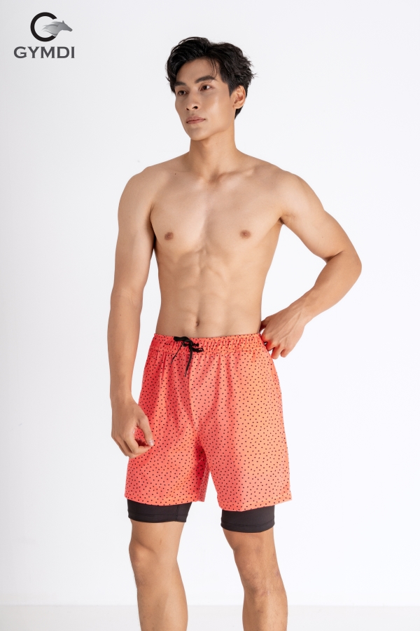 Quần đi biển hai lớp cam họa tiết chấm