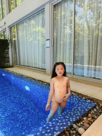Bộ liền bé gái hoa vàng