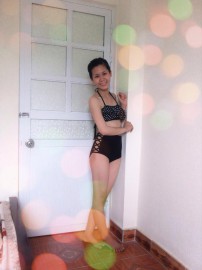 Bikini áo đen bèo chấm bi - quần đan dây 