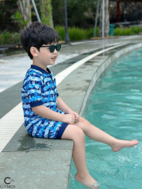Bộ liền quần đùi bé trai cộc tay xanh