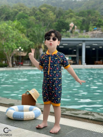 Bộ liền quần đùi bé trai cộc tay khủng long vàng
