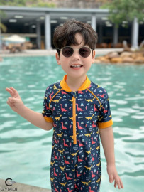 Bộ liền quần đùi bé trai cộc tay khủng long vàng